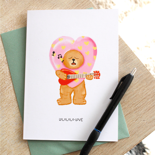 Bear Serenading With a Guitar